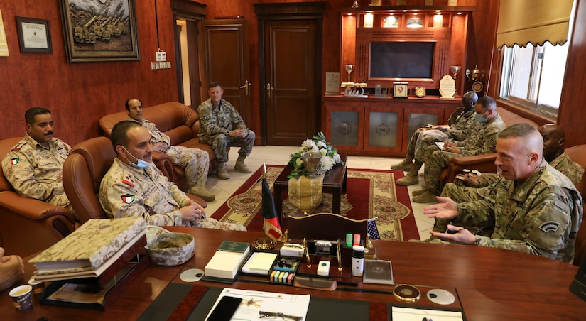 U.S. Army Major General Steven Ferrari met with Kuwait Land Forces Brigadier General Khaled A. Al-Shualah, Oct. 22, 2020, in Kuwait. The Ferrari, the Commander of Task Force Spartan, and Al-Shualah, the Commander of the Kuwait Land Forces Artillery Regiment, met during a key leader engagement at the KLF Artillery Regiment. (U.S. Army photo by Sgt. Trevor Cullen)