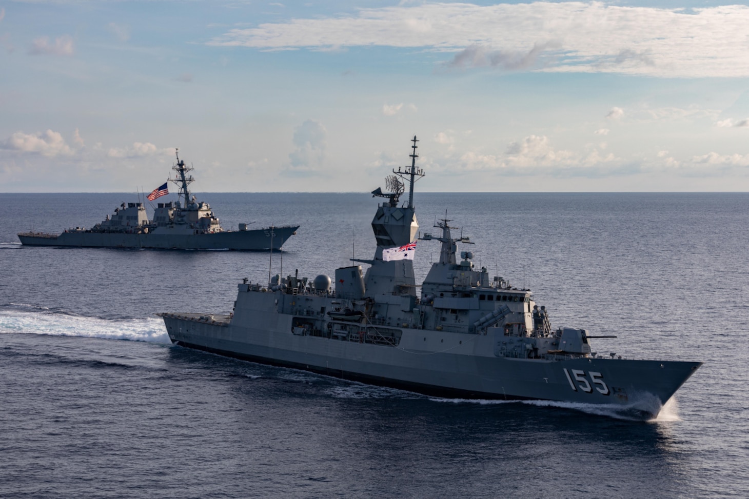SOUTH CHINA SEA - The Arleigh Burke-class guided-missile destroyer USS John S. McCain (DDG 56) (rear) and the Royal Australian Navy Anzac-class frigate HMAS Ballarat (FFH 155) (front) sail together during integrated operations Oct. 27, 2020. John S. McCain is underway conducting operations in support of a free and open Indo-Pacific, while assigned to Destroyer Squadron (DESRON) 15, the Navy's largest forward-deployed DESRON and the U.S. 7th Fleet's principal surface force.