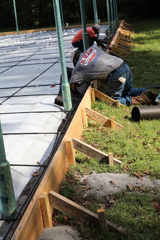 Contractors work to upgrade tennis courts at the U.S. Army Engineer Research and Development Center (ERDC) in Vicksburg, Miss. in October 2020. The work is part of the ERDC Master Plan, developed by the Installation Operations Division with a goal of enhancing quality of life and safety on all ERDC properties.