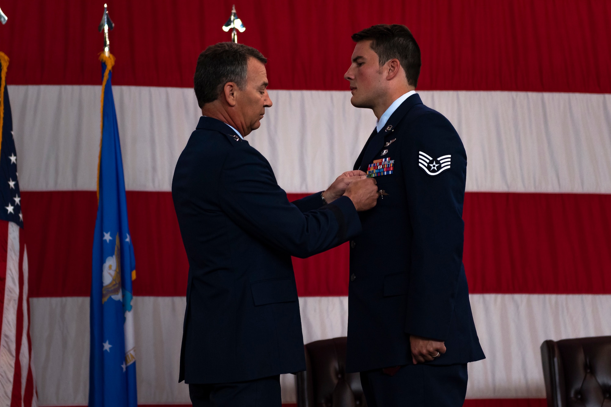 A photo of an Airman receiving a medal