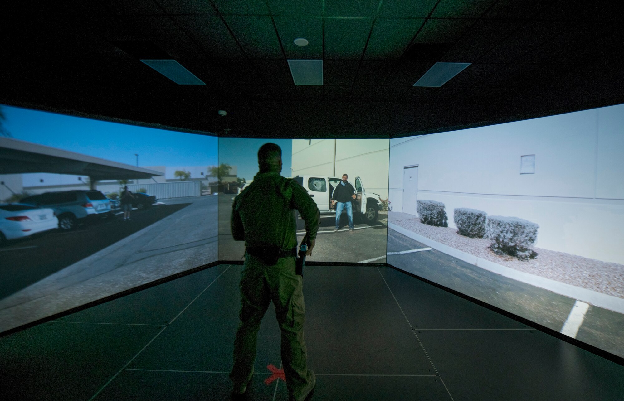 A member of the 502d Security Forces Squadron responds to a virtual hostile exercise at the Alamo Area Council of Governments, San Antonio, Texas, Oct 22, 2020.
