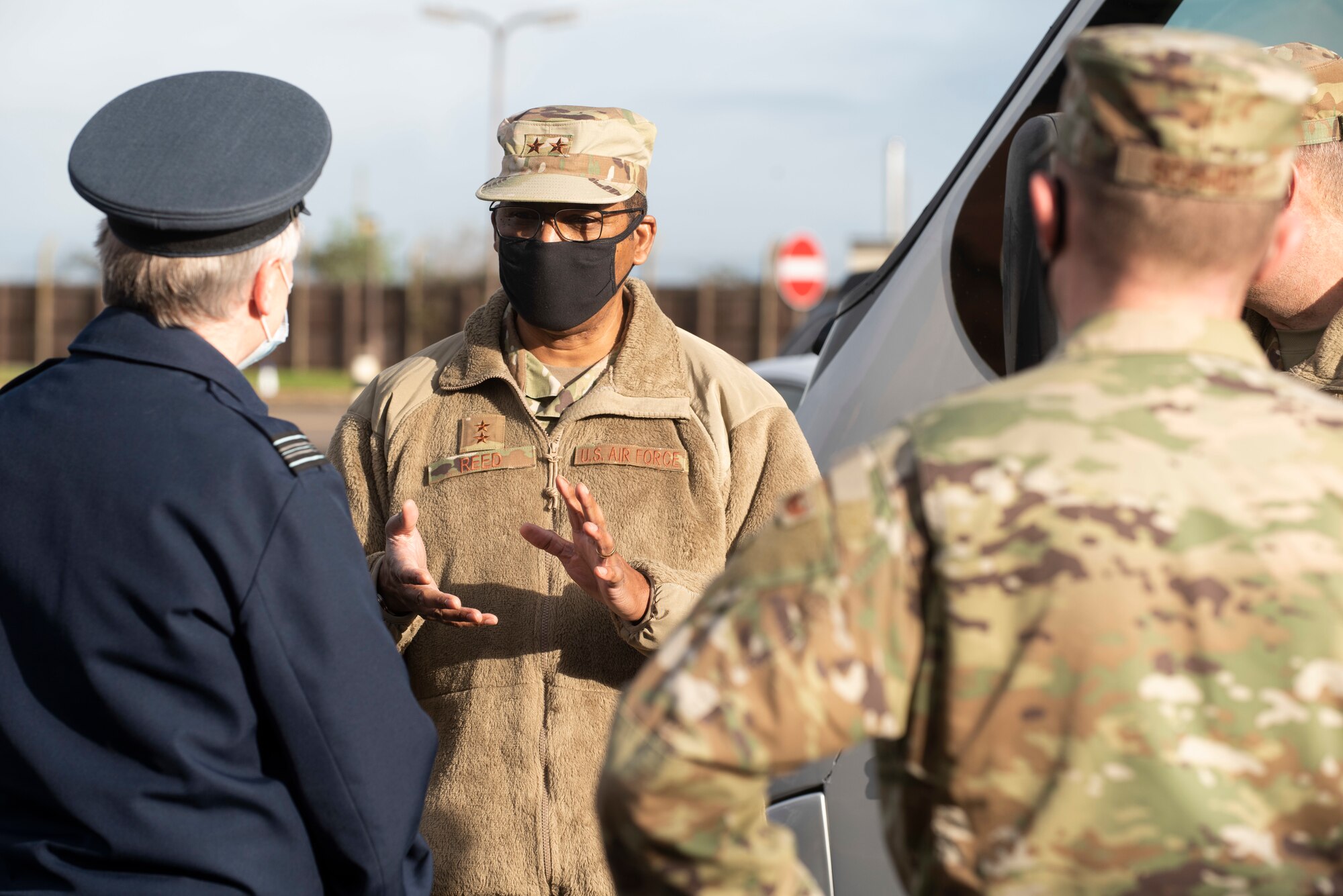 U.S. Air Force Maj. Gen. Randall Reed (center), Third Air Force commander, greets Royal Air Force Sqn. Ldr. Clive Wood (left), RAF Alconbury and RAF Molesworth RAF commander, during his visit to the 501st Combat Support Wing at RAF Alconbury, England, Oct. 26, 2020. The Third Air Force command team toured six bases in the 501st Combat Support Wing as part of a new commander’s immersion tour. (U.S. Air Force photo by Senior Airman Jennifer Zima)