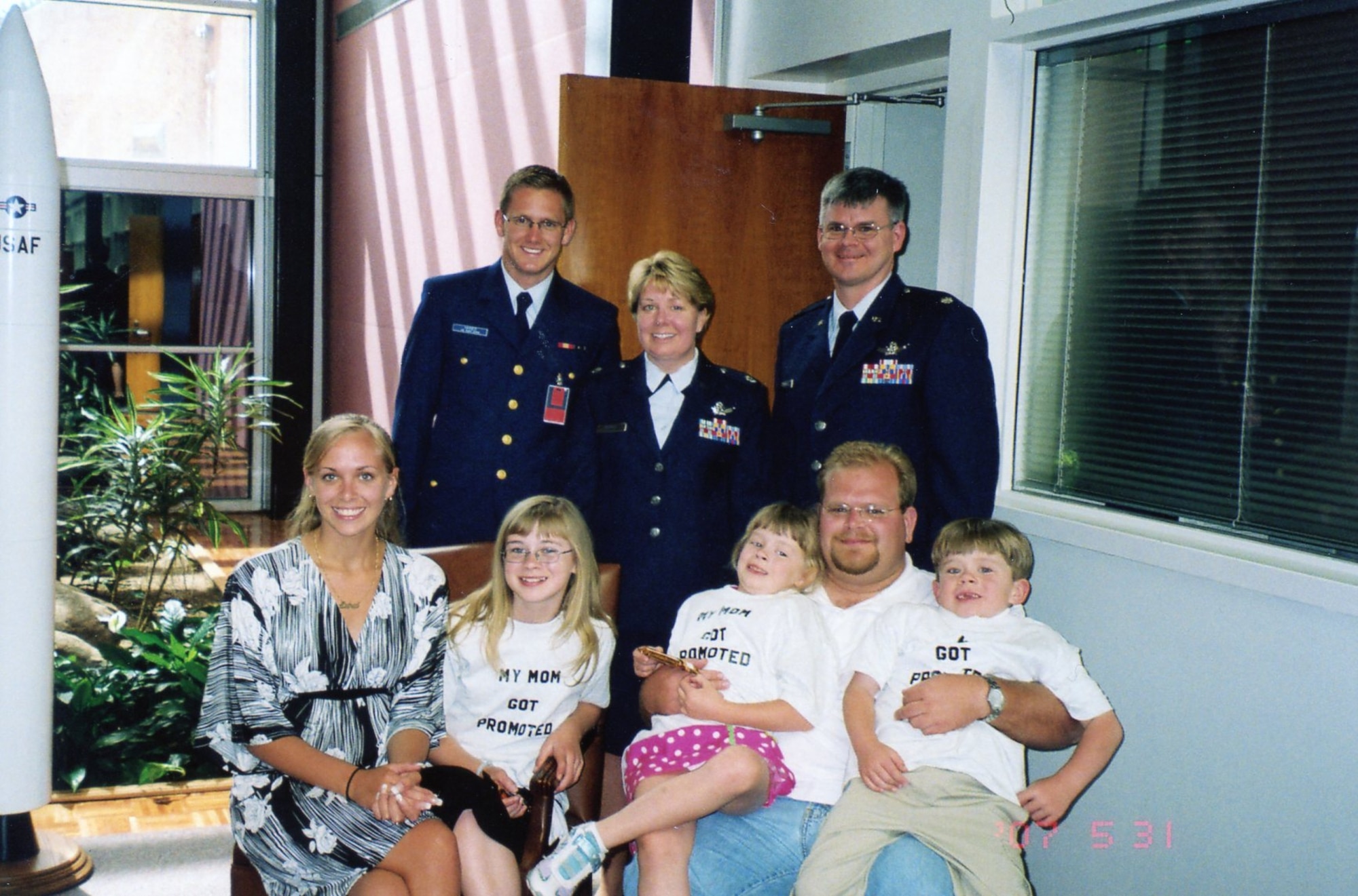 Family poses for a photo.