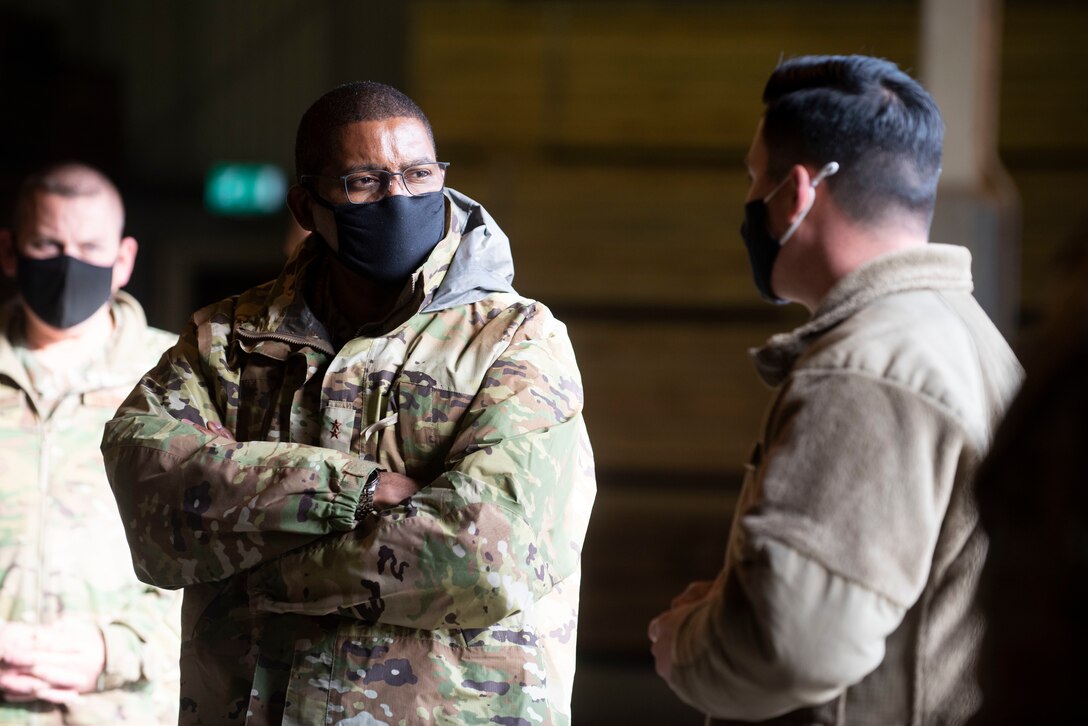U.S. Air Force Maj. Christopher Wood right, 420th Munitions Squadron commander, briefs Maj. Gen. Randall Reed center, Third Air Force commander, about the wood handling facility at Royal Air Force Welford, England, Oct. 28, 2020. The Third Air Force command team toured six bases in the 501st Combat Support Wing as part of a new commander’s immersion tour. (U.S. Air Force photo by Senior Airman Jennifer Zima)