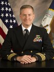 A studio photo of Commander Vince Libasci (U.S. Navy photo by Mass Communication Specialist 2nd Class Jacob Milham)