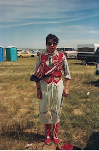 Air Force Master Sgt. Mary Lohnes Dressed in traditional Native American Regalia to attend a Wacipi in Cannon Ball, N.D. while on leave from the U.S. Army.