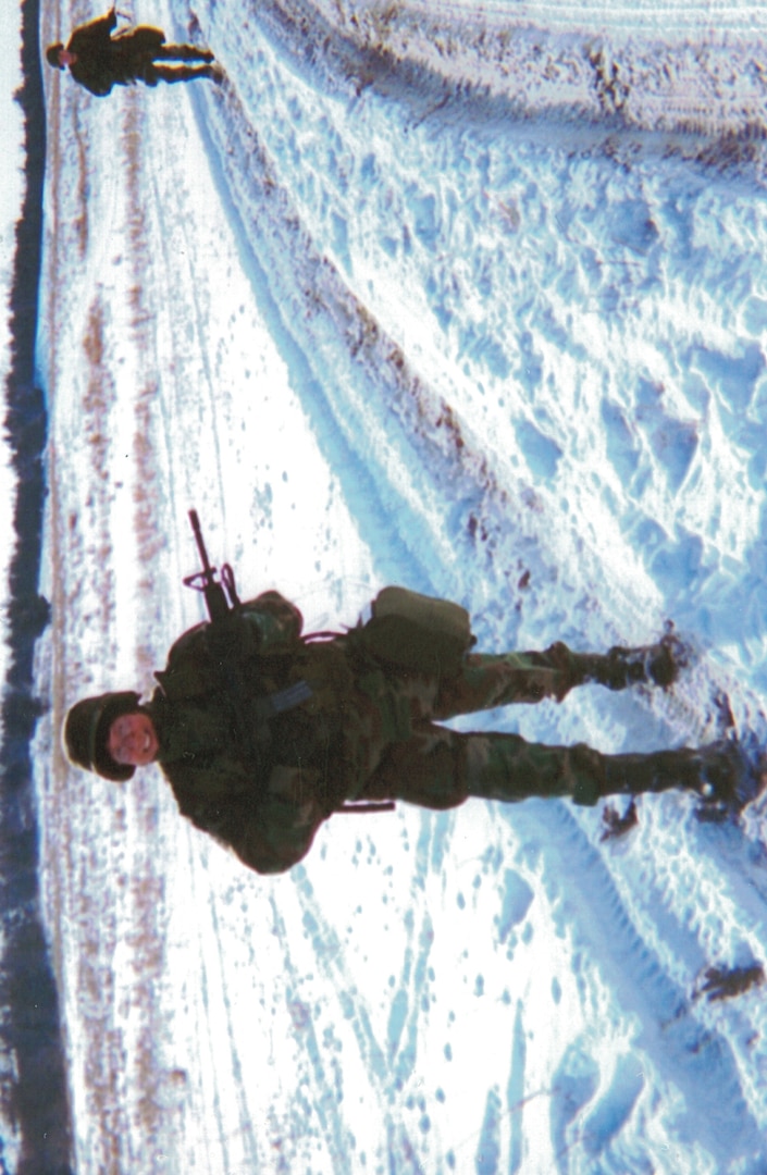 Mary Lohnes, on patrol during a winter exercise while an Active Guard Reservist with Nebraska Army National Guard.