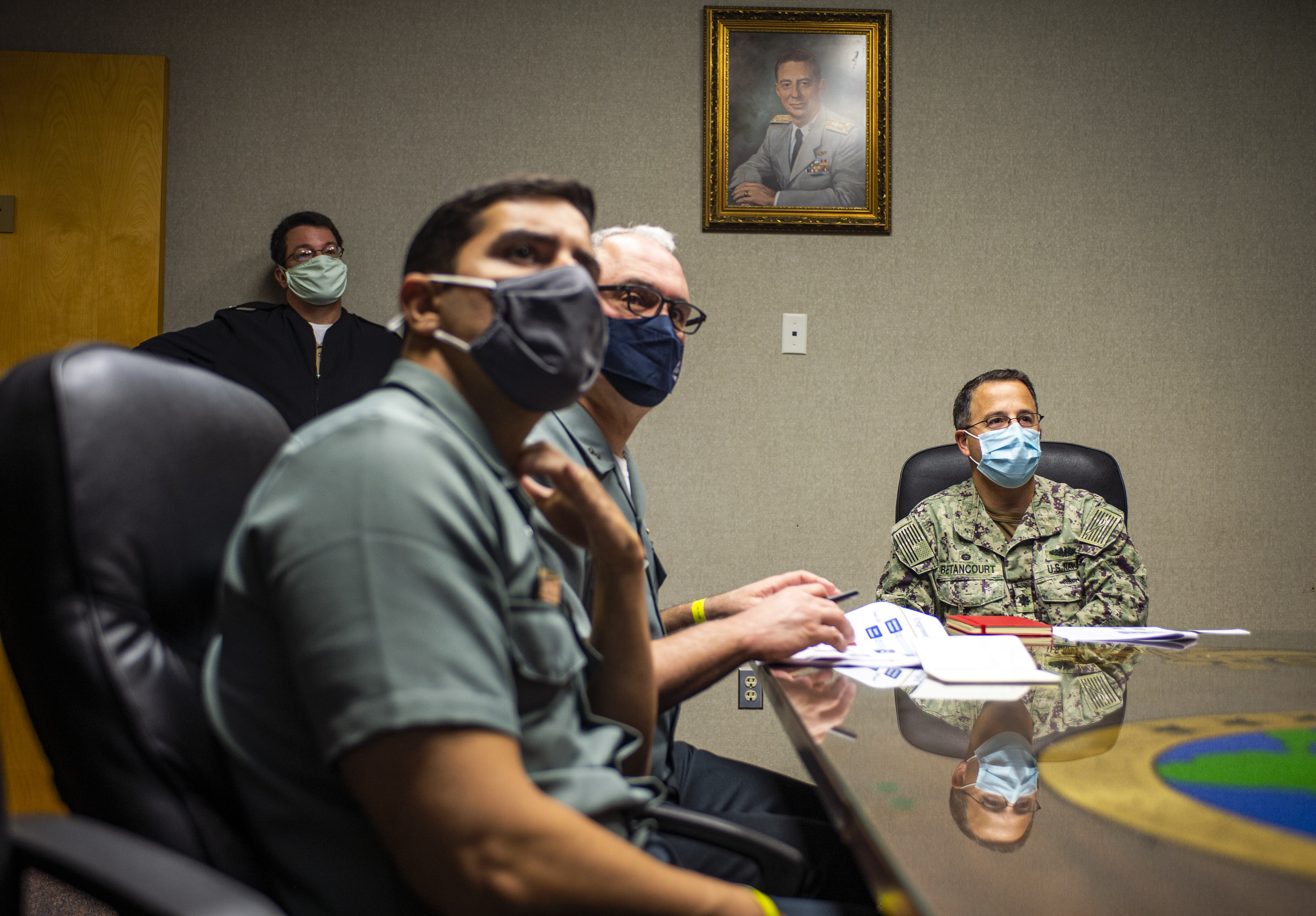 Cmdr. Richard Bentancourt, right, commanding officer of Submarine Learning Facility Norfolk (SLFN,) briefs Rear Adm. Thadeu Lobo, commander, Brazilian Submarine Force, at the SLFN headquarters Oct. 27, 2020.