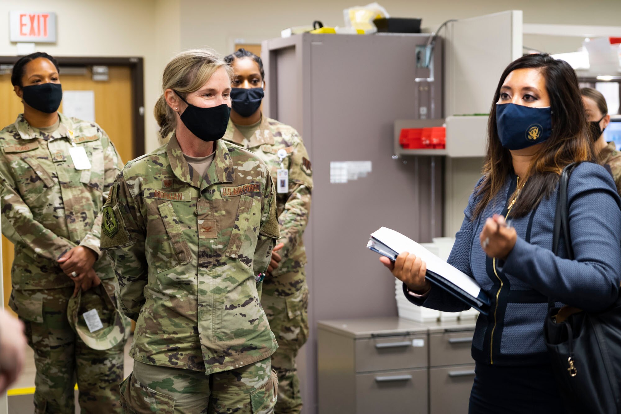 A photo of a representative interviewing Airmen
