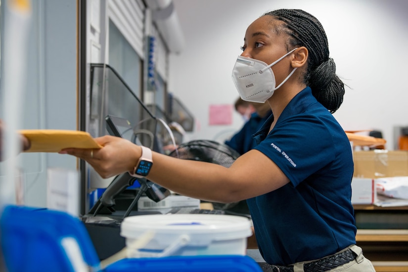 An airman receives mail.