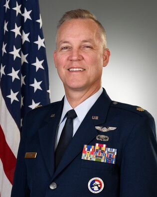 Maj. Scott Allen, 910th Airlift Wing public affairs officer, poses for a photo July 31, 2020, at Youngstown Air Reserve Station.