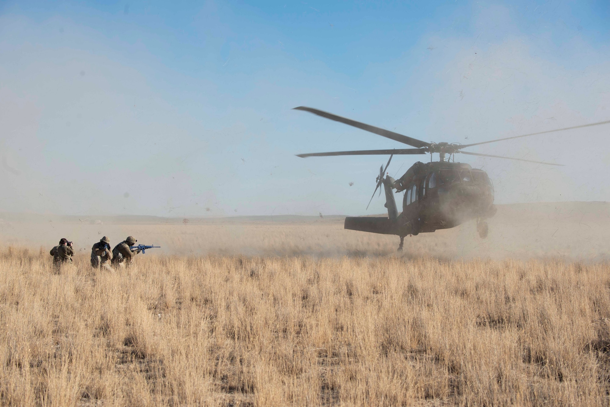 Airmen practice defensive positions during a medical evacation training exercise Mountain Home Range Complex, Idaho, Oct. 22, 2020. The 366th Civil Engineer Squadron held exercise Raging TORO to showcase their ability to deploy at a moment’s notice. (U.S. Air Force photo by Airman 1st Class Antwain Hanks)