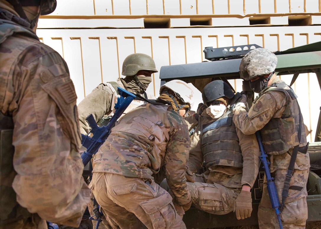 Airmen practice a causualty extraction at the Mountain Home Range Complex, Idaho, Oct. 22, 2020. The 366th Civil Engineer Squadron held exercise Raging TORO to showcase their ability to deploy at a moment’s notice. (U.S. Air Force photo by Airman Andrea Rozoto)