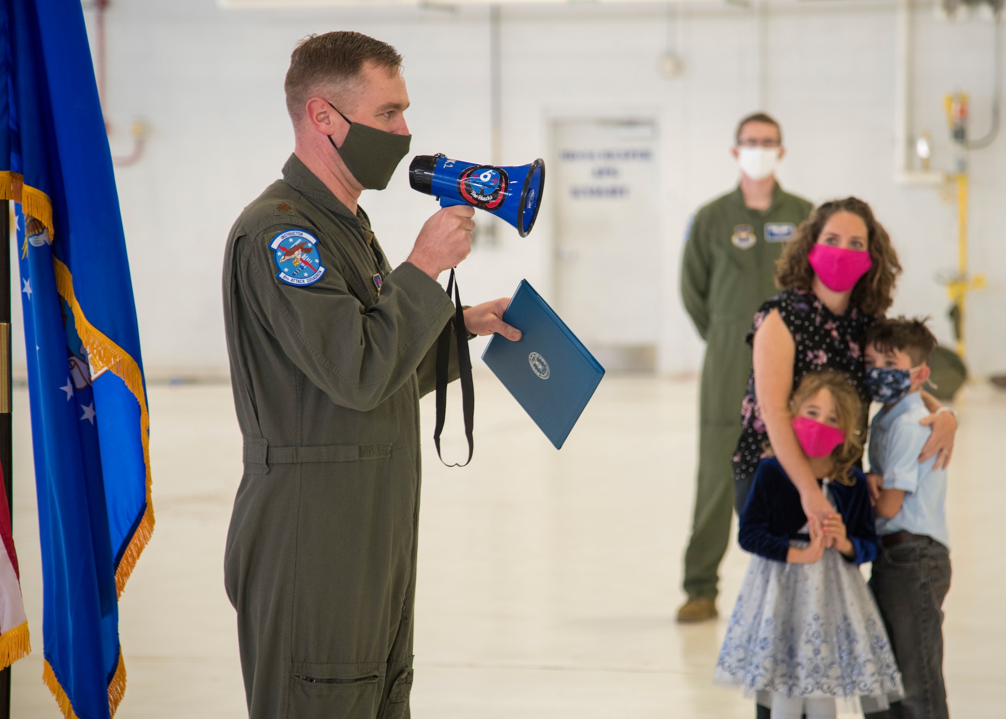 Maj. Chad Swinehart, 6th Attack Squadron director of operations, speaks to an audience, Oct. 26, 2020, during a Bronze Star Medal presentation on Holloman Air Force Base, New Mexico. During his time deployed, Swinehart led the tactical operations of the sole U.S. Air Force Air Advisory Squadron. (U.S. Air Force photo by Senior Airman Collette Brooks)