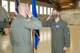 Maj. Chad Swinehart, right, 6th Attack Squadron director of operations, salutes Col. Ryan Keeney, left, 49th Wing commander, Oct. 26, 2020, during a Bronze Star Medal presentation on Holloman Air Force Base, New Mexico. While deployed Swinehart led military personnel and linguists from three nations and 18 distinct specialty career fields, in the integration and advancement of Iraq’s rotary wing mission which contributed to him earning a Bronze Star Medal. (U.S. Air Force photo by Senior Airman Collette Brooks)