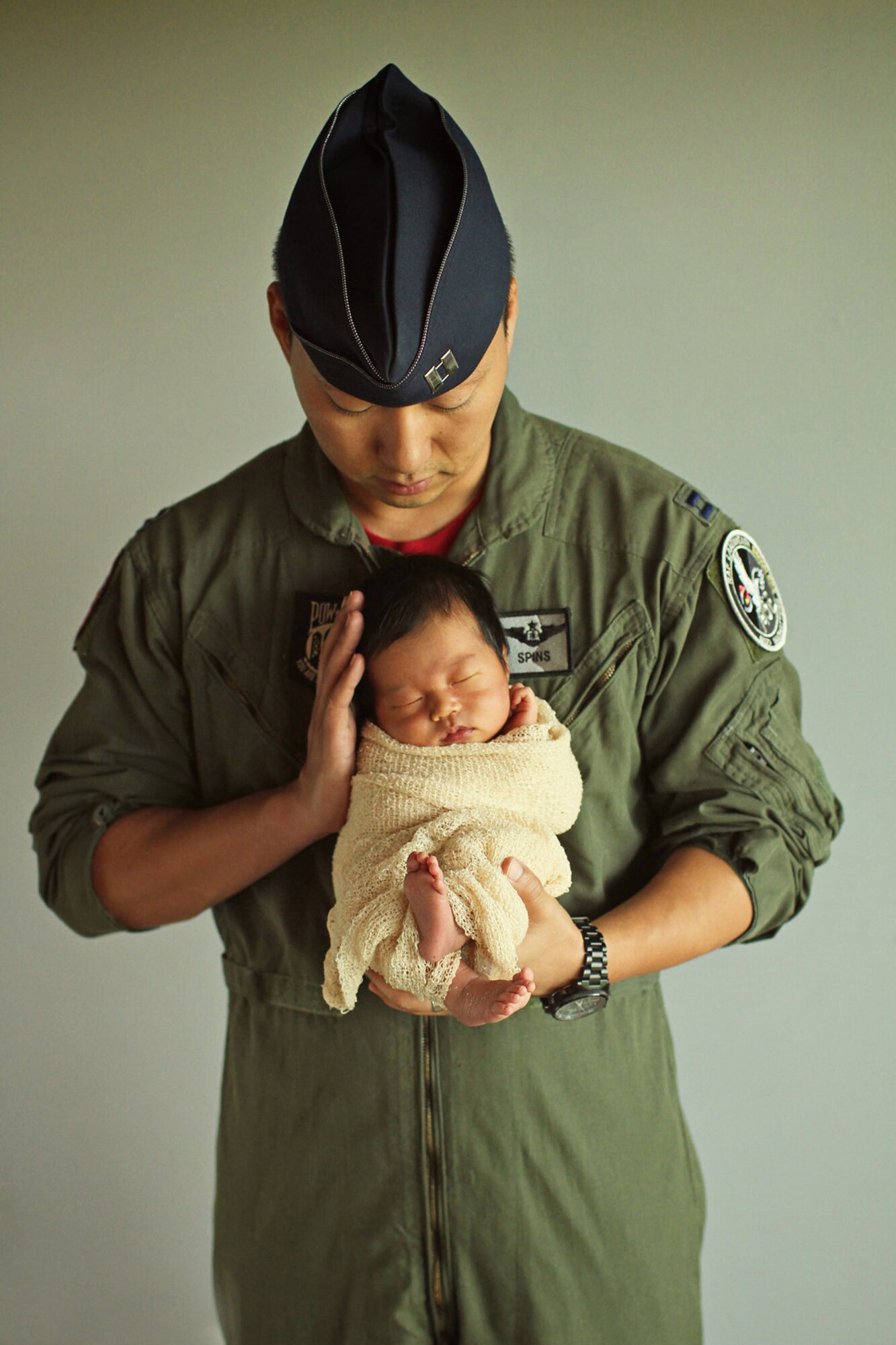 Then Capt. Jay Park, holds his third child and first son, Josiah. Park immigrated to the U.S. with his parents when he was eight year’s old.