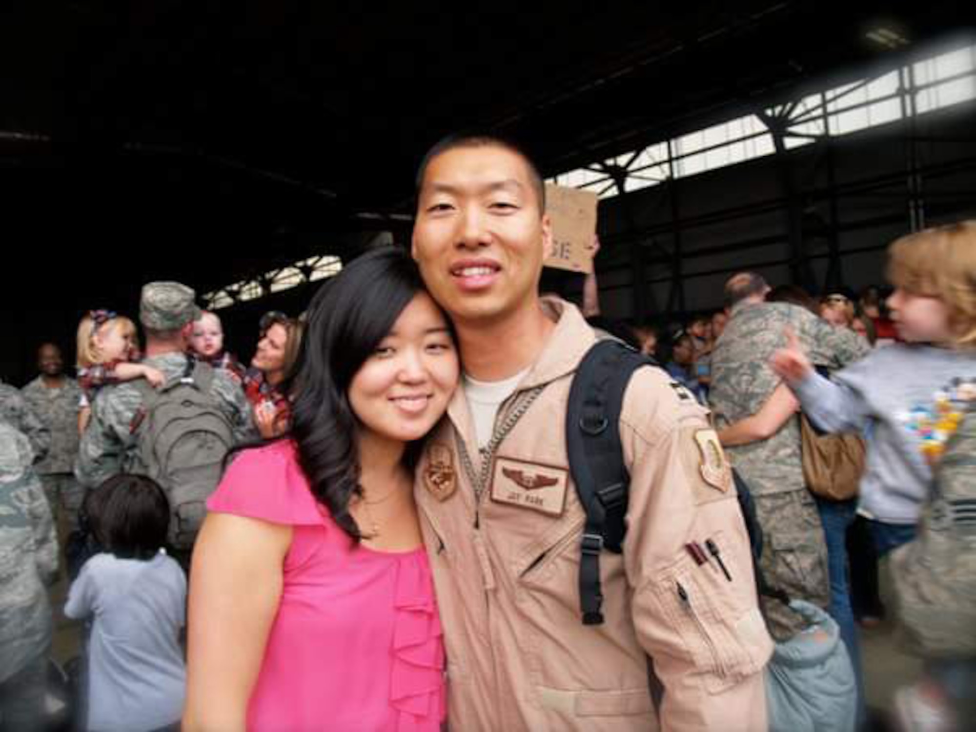 Then Capt. Jay Park, is greeted by his wife, Anna, after arriving home from his first deployment at RAF Lakenheath, England.