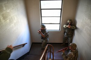 Security Forces Airmen search for active shooter.