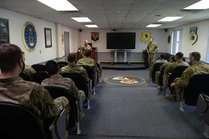 Chief Master Sgt. Jason Colón, left, 628 Air Base Wing Command Chief and Col. Marc Greene, 628th ABW commander, speak to Airmen of Class 20-E of Airman Leadership School at Joint Base Charleston, S.C., Aug. 26, 2020. Colón rose through the ranks as a Special Operations Weather Technician and has been in the Air Force for 30 years.