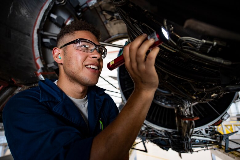 Staff Sgt. Wilfredo Vargas, 911th Maintenance Squadron aerospace propulsion technician, inspects a C-17 Globemaster III engine during a home station check at the Pittsburgh International Airport Air Reserve Station, Pennsylvania, July 20, 2020.
