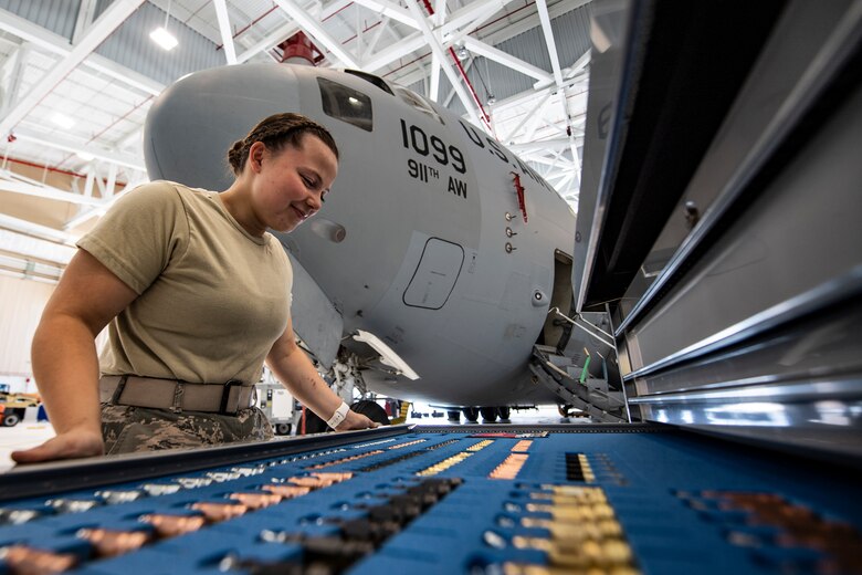 Senior Airman Natalie Rupp, 911th Maintenance Squadron structural maintenance technician, checks a toolbox after inspecting a C-17 Globemaster III during a home station check at the Pittsburgh International Airport Air Reserve Station, Pennsylvania, July 20, 2020.