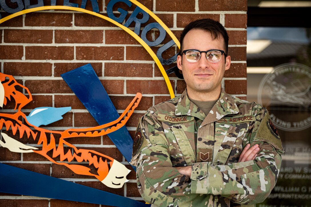 Photo of Airman posing for a photo.