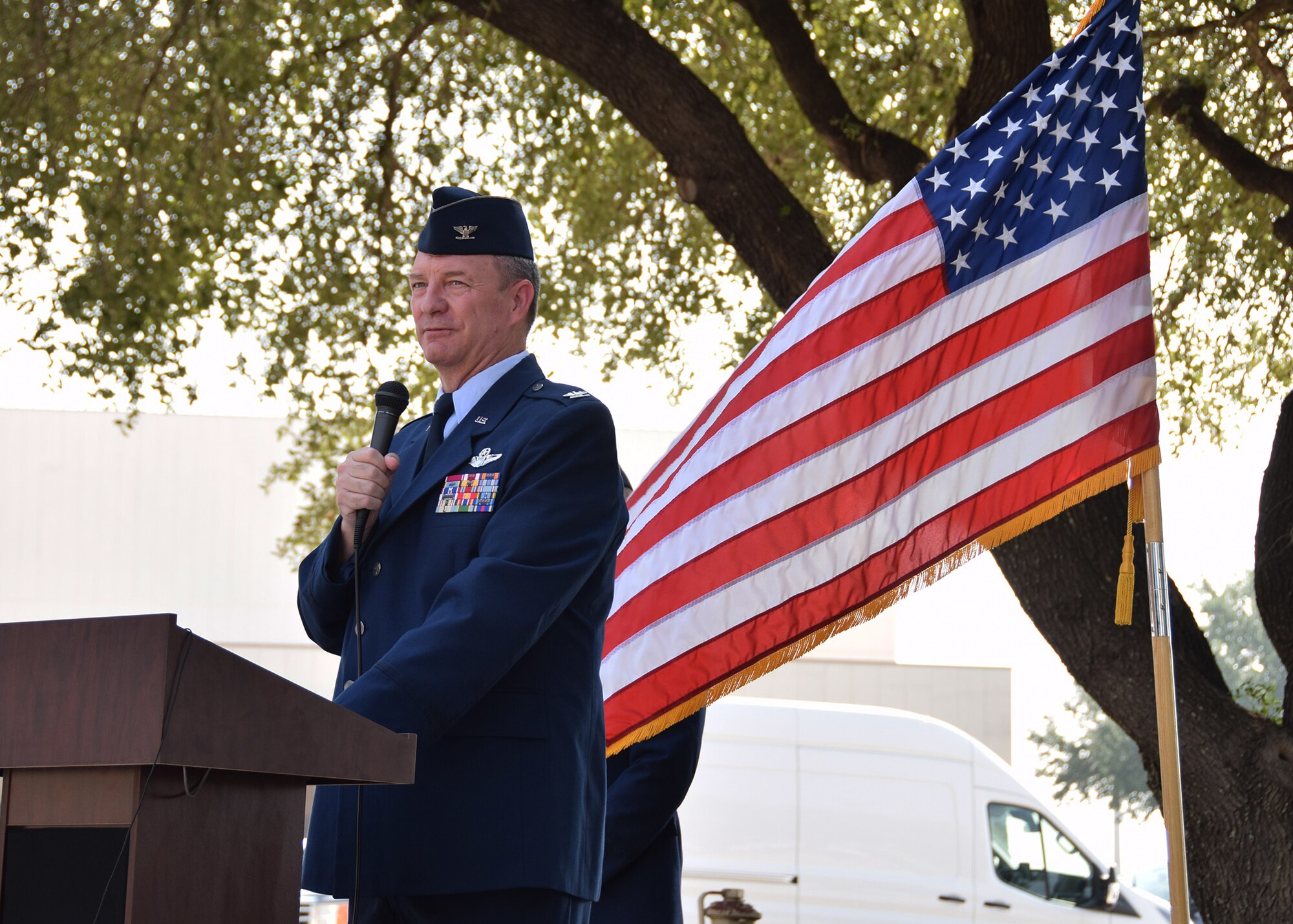 Col. Terry W. McClain, 433rd Airlift Wing commander, makes opening remarks during a remembrance and wreath laying ceremony for mission BRAVO-12 Aug. 28, 2020 at Joint Base San Antonio-Lackland, Texas.