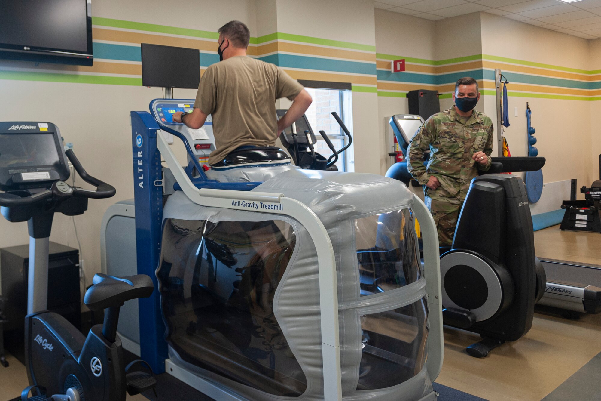Photo of Col Walls running on an anti-gravity treadmill