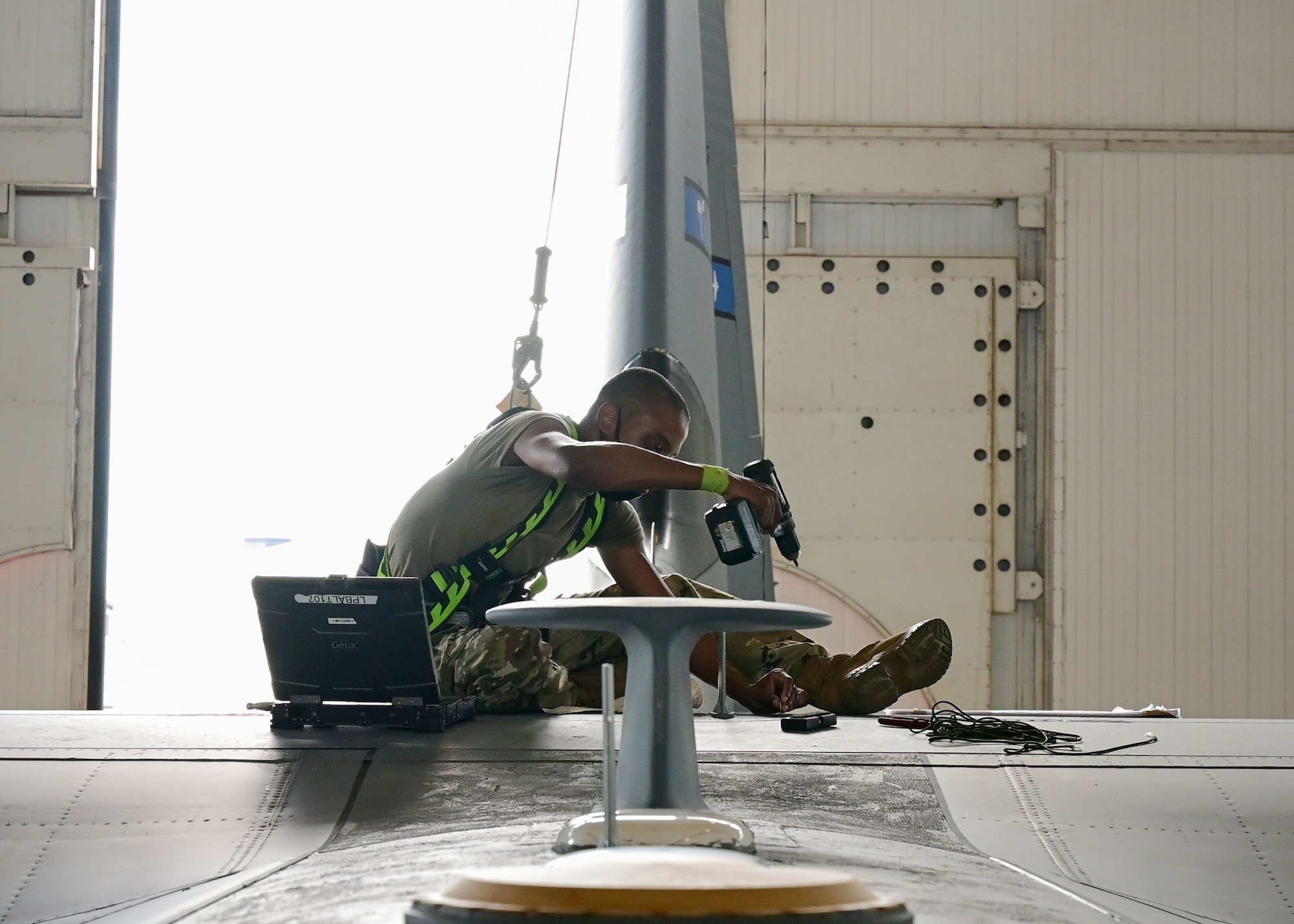 An Airman works on an aircraft