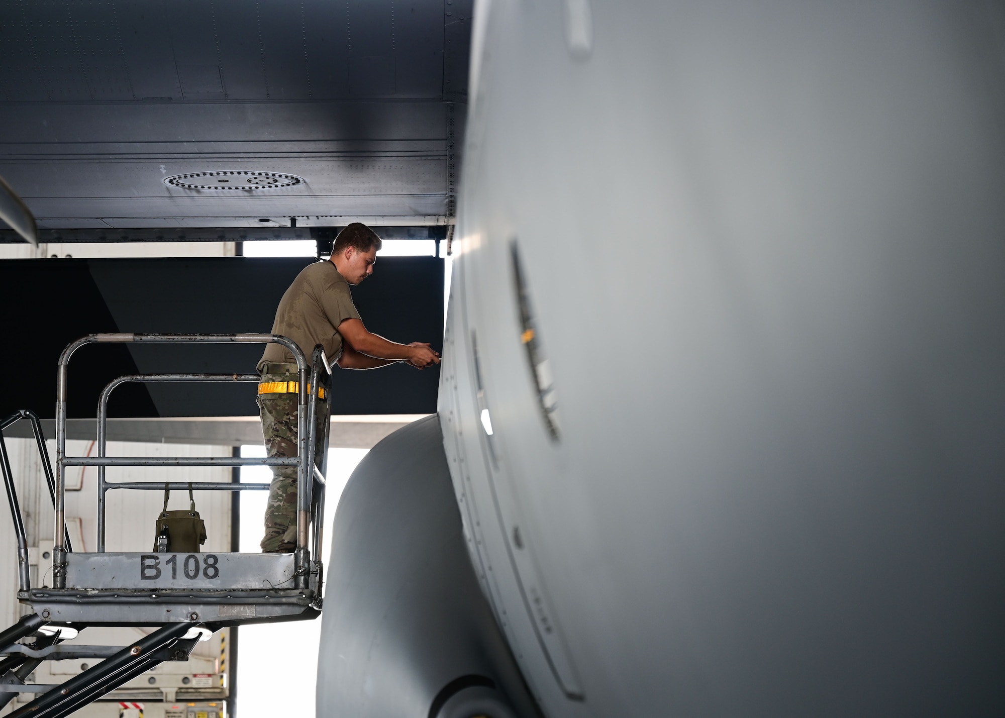 An Airman works on an aircraft