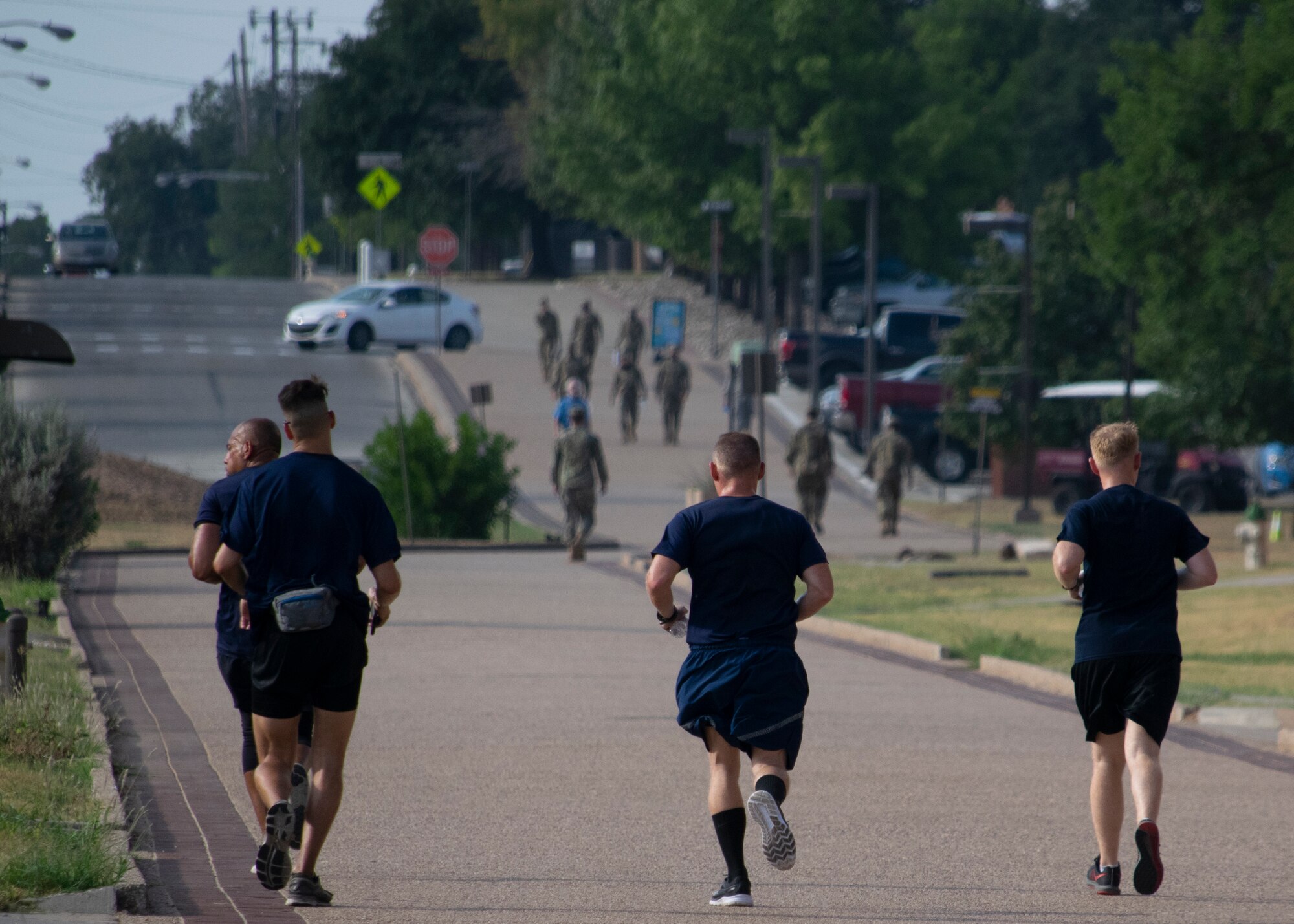 U.S. Air Force 1st Lt. Christian Bills, 315th Training Squadron student, runs the 2020 Air Force Marathon with pacers from his squadron, on Goodfellow Air Force Base, Texas, Sept. 1, 2020. The AFM operated virtually for the health and safety of participants and others involved, while the COVID-19 pandemic existed. (Courtesy photo by Mr. Tony Lynch)