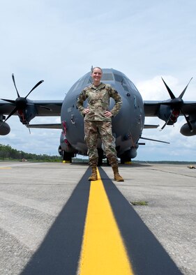 U.S. Air Force Maj. Theresa Izell, commander of the 1st Special Operations Aircraft Maintenance Squadron, stands in front of an AC-130J Ghostrider gunship at Hurlburt Field, Florida, Aug. 19, 2020. The mission of the 1st SOAMXS is to generate combat capability in the form of safe and reliable special mission aircraft such as the AC-130J Ghostrider gunship. (U.S. Air Force photo by Airman 1st Class Robyn Hunsinger)