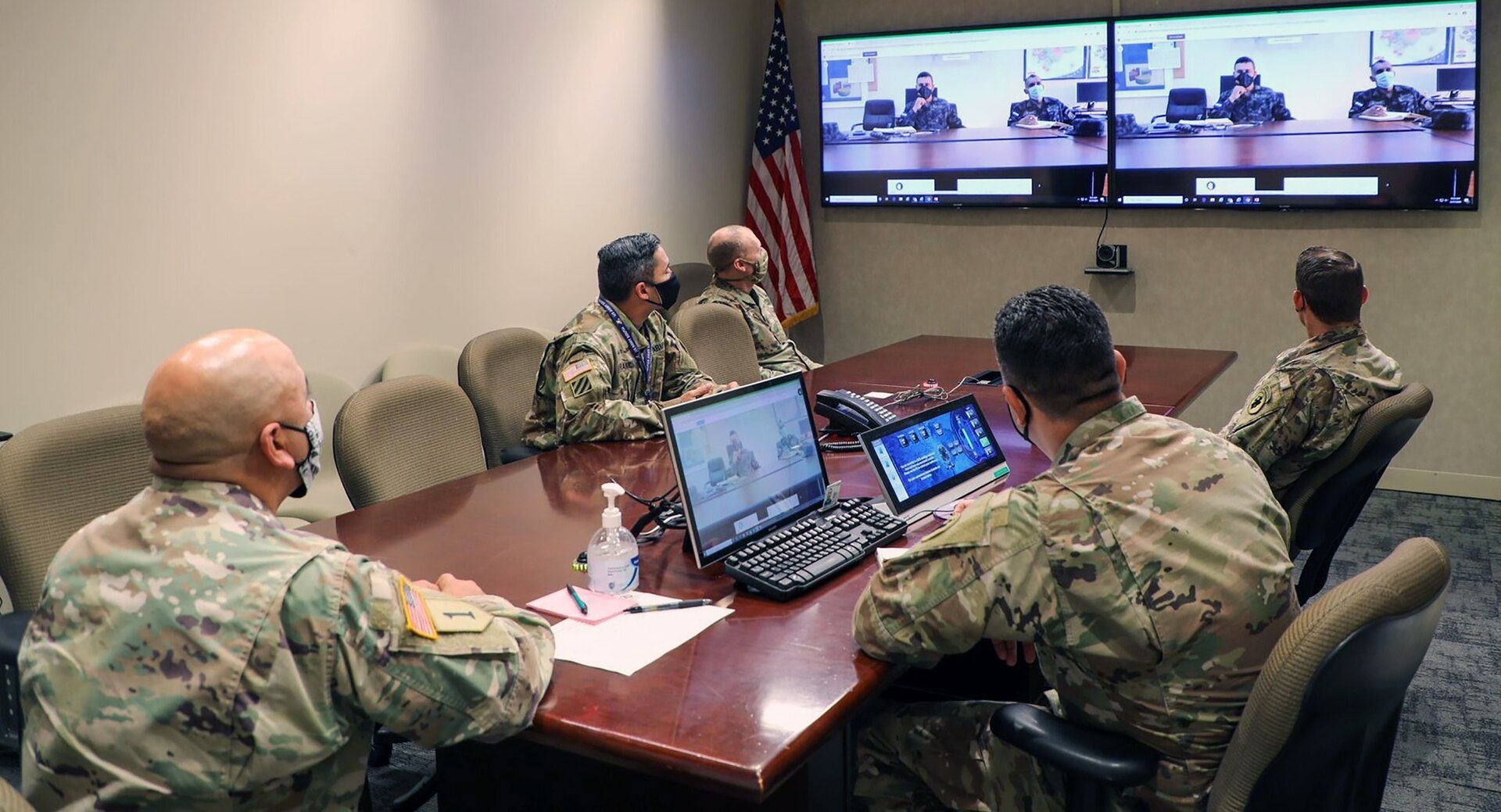 Personnel from the U.S. Army South Security Cooperation Division, listen in during the Central America Working Group virtual meeting held Aug. 24-28.