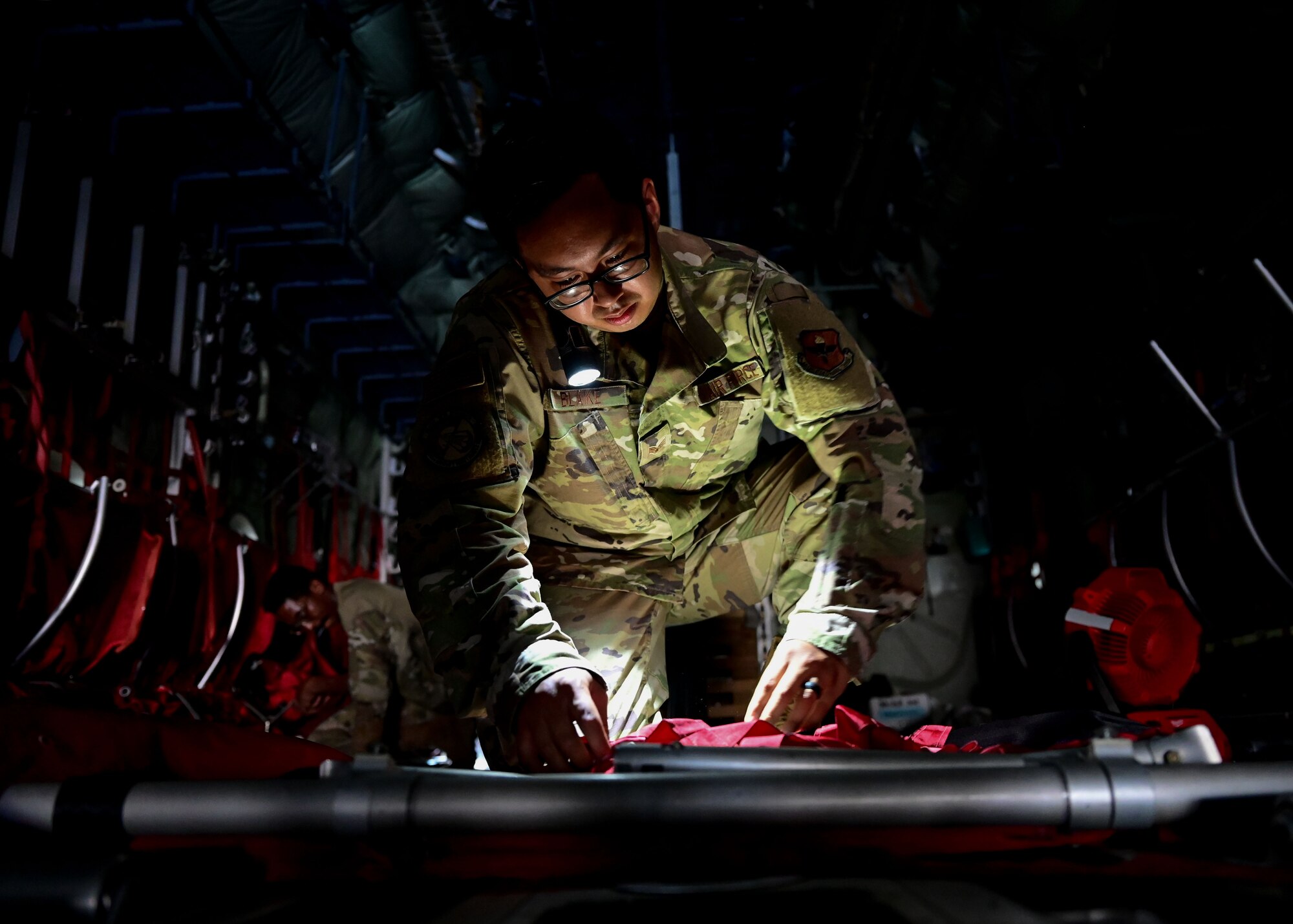 An Airman works on an aircraft