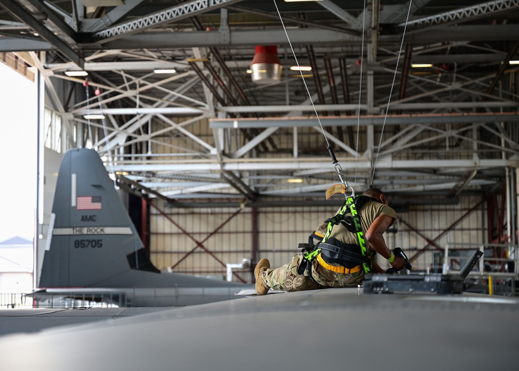 An Airman works on an aircraft