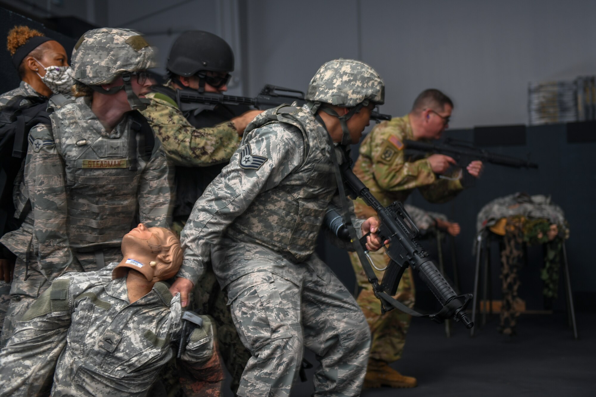 Soldiers, Sailors and Airmen participate in ‘Care Under Fire’ and Tactical Field Care as part of their Tactical Combat Casualty Care assessment.