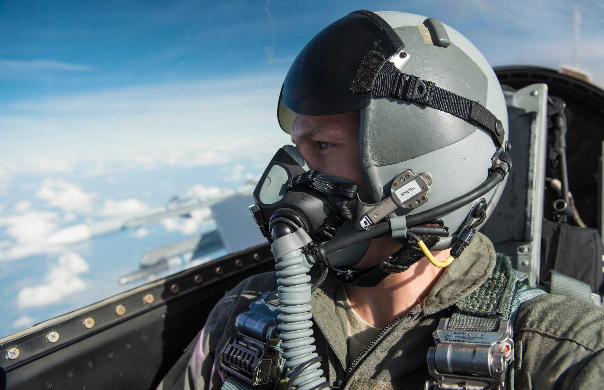 Senior Airman Chance Nardone, 52nd Fighter Wing Public Affairs, broadcast journalist, takes a selfie while documenting two F-16 Fighting Falcons, attached to the 480th Expeditionary Fighter Squadron, on their way to drop inert guided bombing units at the D-37 Range in Nadarzyce, Poland, 24 August 2020. The 480th's presence in Poland during Aviation Detachment Rotation 20-4 has allowed for increased joint readiness and strengthened relationships between the two NATO Allies. (U.S. Air Force photo by Senior Airman Chanceler Nardone)