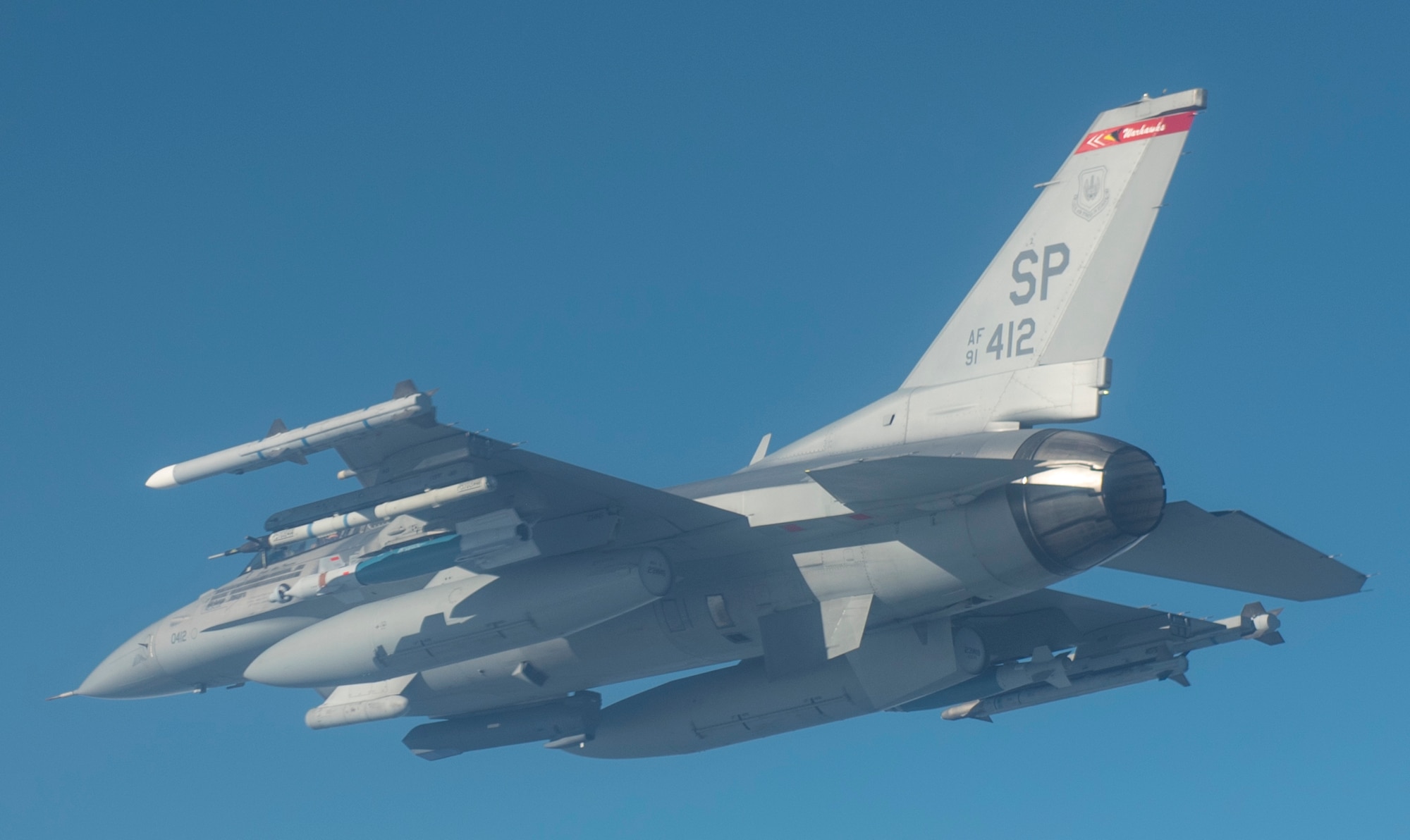 A U.S. F-16 Fighting Falcon assigned to the 480th Expeditionary Fighter Squadron, carries inert guided bombing units during Aviation Detachment Rotation 20-4, near Lask Air Base, Poland, 24 August 2020. NATO allies stand united and determined to defend NATO territory and deter aggression from adversaries.  (U.S. Air Force photo by Senior Airman Chanceler Nardone)