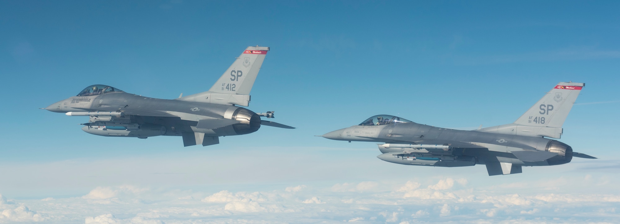 Two U.S. F-16 Fighting Falcons attached to the 480th Expeditionary Fighter Squadron, fly towards the D-37 Range in Nadarzyce, Poland, 24 August 2020. Through strengthened relationships and engagements with our Allies, the United States and NATO demonstrate their shared commitment to a peaceful, stable and secure Europe. (U.S. Air Force photo by Senior Airman Chanceler Nardone)