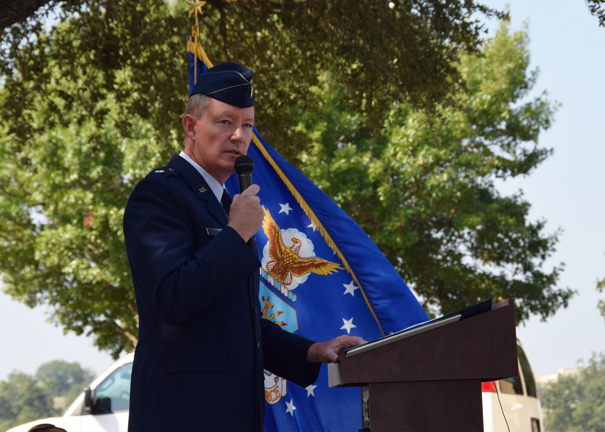 Lt. Col. Douglas P. Schoenenberger, 68th Airlift Squadron commander and ceremony narrator, speaks during the remembrance and wreath laying ceremony for the 30th anniversary of the BRAVO-12 mission held Aug. 28, 2020 at Joint Base San Antonio-Lackland, Texas.