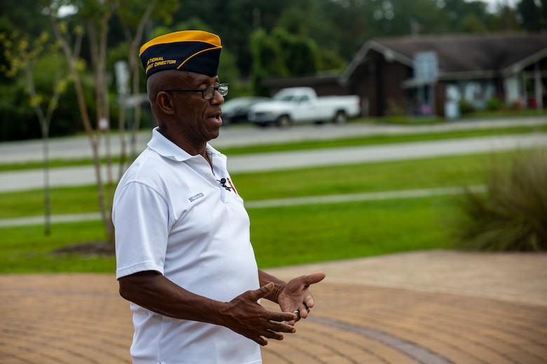 Houston Shinal, the previous national monument director for the National Montford Point Marine Association, conducts an interview about the Montford Point Marines at the Montford Point Marines Memorial in Jacksonville, North Carolina, Aug 17, 2020. This year marks the 78th anniversary of when the first African-American recruits arrived on Montford Point in 1942 for Marine Corps recruit training and paving the way for approximately 20,000 African-Americans over the next 7 years to earn the title of Marine. (U.S. Marine Corps photo by Lance Cpl. Isaiah Gomez)