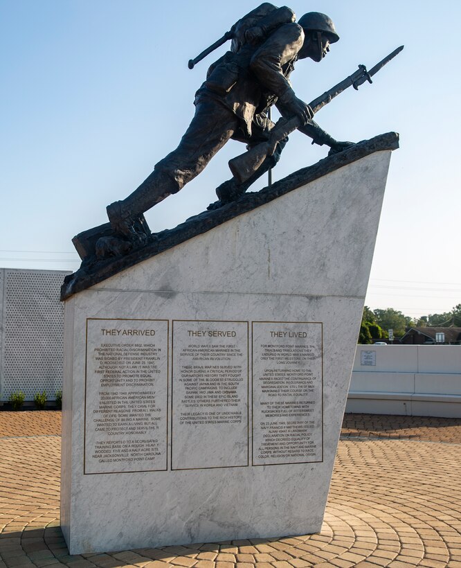 The Montford Point Marine Sculpture that signifies the Montford Point Marines’ transition to infantry men from their assigned duties as ammunition suppliers and other support roles, stands at the Montford Point Marines Memorial in Jacksonville, North Carolina, Aug. 26, 2020. This year marks the 78th anniversary of when the first African-American recruits arrived on Montford Point in 1942 for Marine Corps recruit training, paving the way for approximately 20,000 African-Americans over the next 7 years to earn the title of Marine. (U.S. Marine Corps photo by Lance Cpl. Christian Ayers)