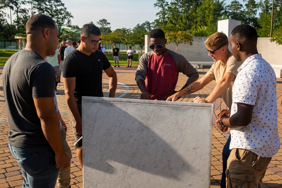 U.S. Marines with 2nd Marine Logistics Group attending the Corporal’s Leadership School on Marine Corps Base Camp Lejeune visit the Montford Point Marines Memorial in Jacksonville, North Carolina, Aug. 26, 2020. This year marks the 78th anniversary of when the first African-American recruits arrived on Montford Point in 1942 for Marine Corps recruit training, paving the way for approximately 20,000 African-Americans over the next 7 years to earn the title of United States Marine. (U.S. Marine Corps photo by Lance Cpl. Christian Ayers)