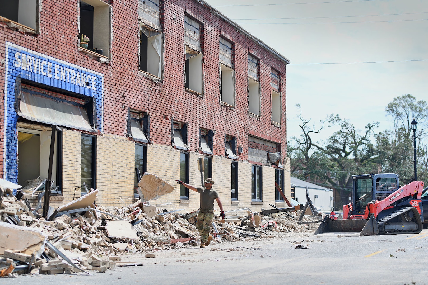 Airmen from the 159th Civil Engineering’s Debris Clearance Package clear rubble from a road in downtown Lake Charles, Louisiana, Aug. 30, 2020. The Louisiana Air National Guard Airmen arrived with heavy equipment after Hurricane Laura’s landfall to clear roadways of the hardest-hit areas in and round Calcasieu Parish.