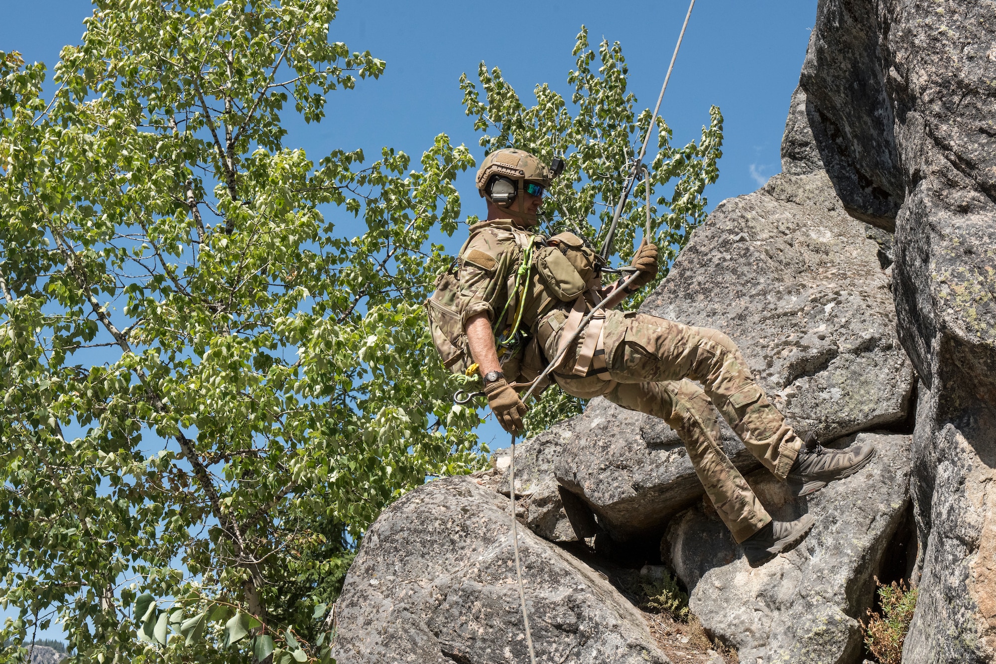 Special warfare tactical air control party Airmen from the 124th Air Support Operations Squadron along with two A-10 Thunderbolt II’s from the 190th Fighter Squadron conduct cliffside search and rescue training with members of the Idaho Mountain Search and Rescue team and the Navy’s Helicopter Sea Combat Squadron Four from North Island Naval Air Station, California, in McCall, Idaho, August 13, 2020. The training included the search and rescue of stranded individuals, followed by their aerial extraction with the HSC-4’s MH-60S Seahawk helicopters. (U.S. Air National Guard photo by Senior Airman Joseph R. Morgan)
