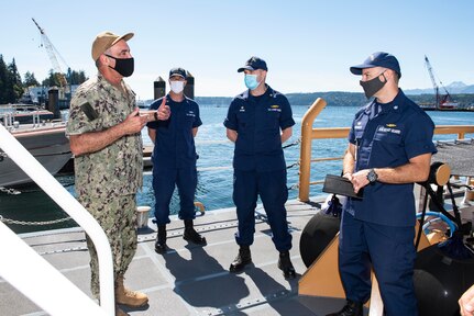 SILVERDALE, Wash. (Sept. 1, 2020) – Adm. Charles Richard, Commander, U.S. Strategic Command, speaks with Maritime Force Protection Unit personnel, during a visit with strategic-deterrent units onboard Naval Base Kitsap-Bangor, Sept. 1. U.S. Strategic Command is a global warfighting combatant command whose mission is to deter strategic attack and employ forces, as directed, to guarantee the security of the U.S. and its allies. (U.S. Navy photo my Mass Communication Specialist 1st Class Andrea Perez/Released)