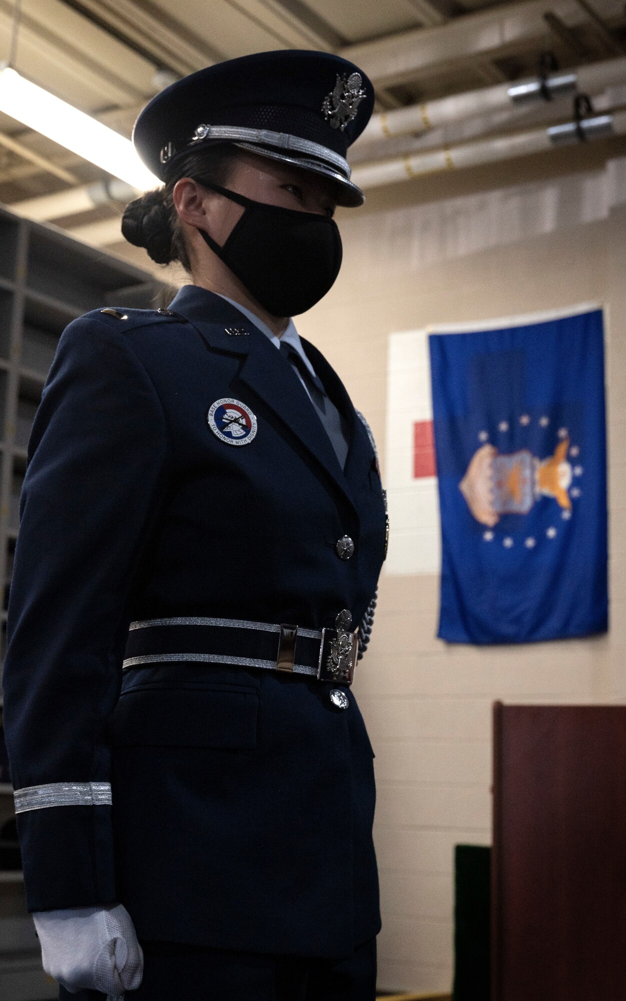 An Airman stands at the position of attention