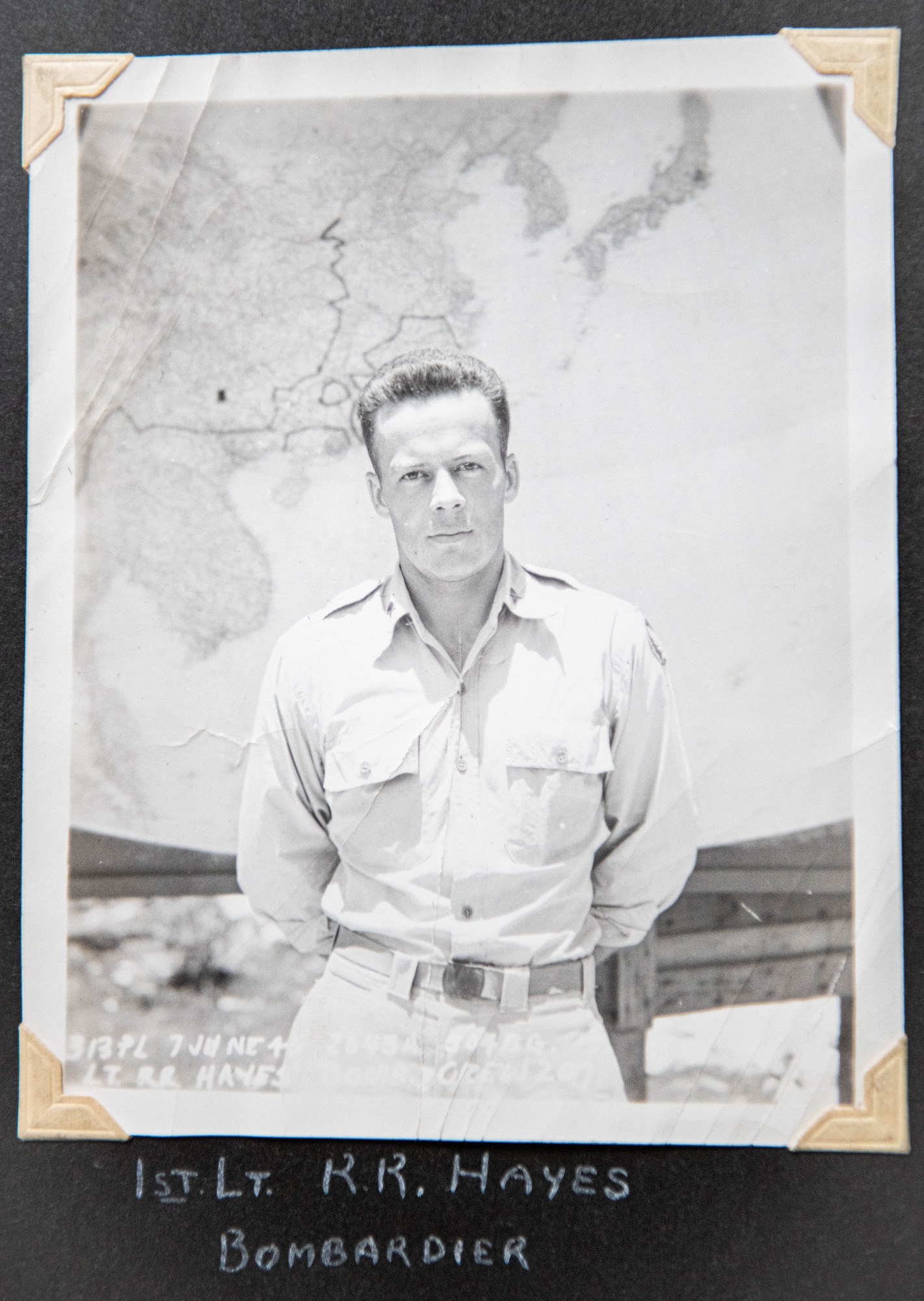 1st Lt. Ralph Richard Hayes, 20th Air Force, Army Air Corps, 421st Bombardment Squadron bombardier, poses for a photo June 7, 1945, during World War II.