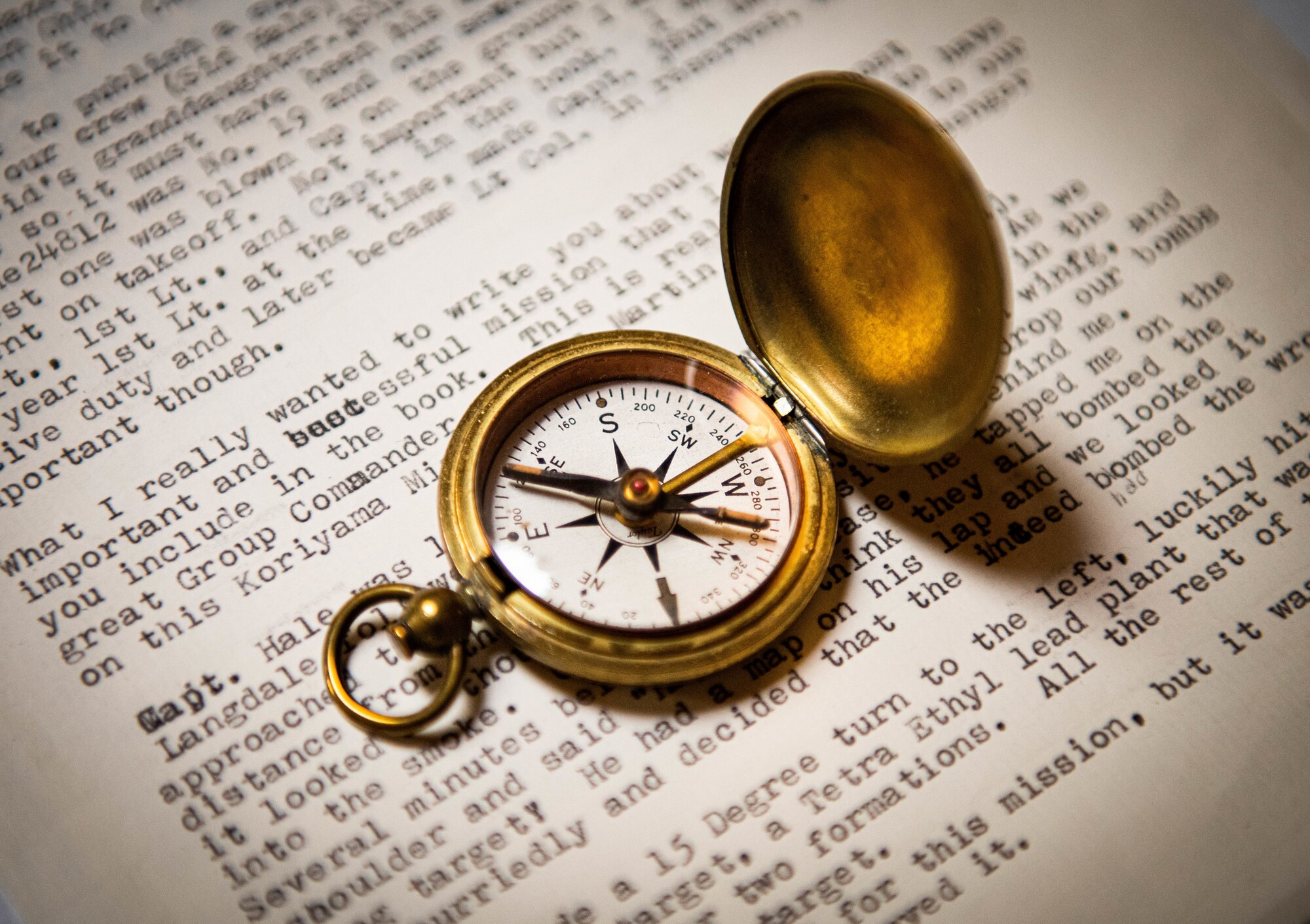 A compass sits on a letter Aug. 12, 2020, in Sun City, Ariz.