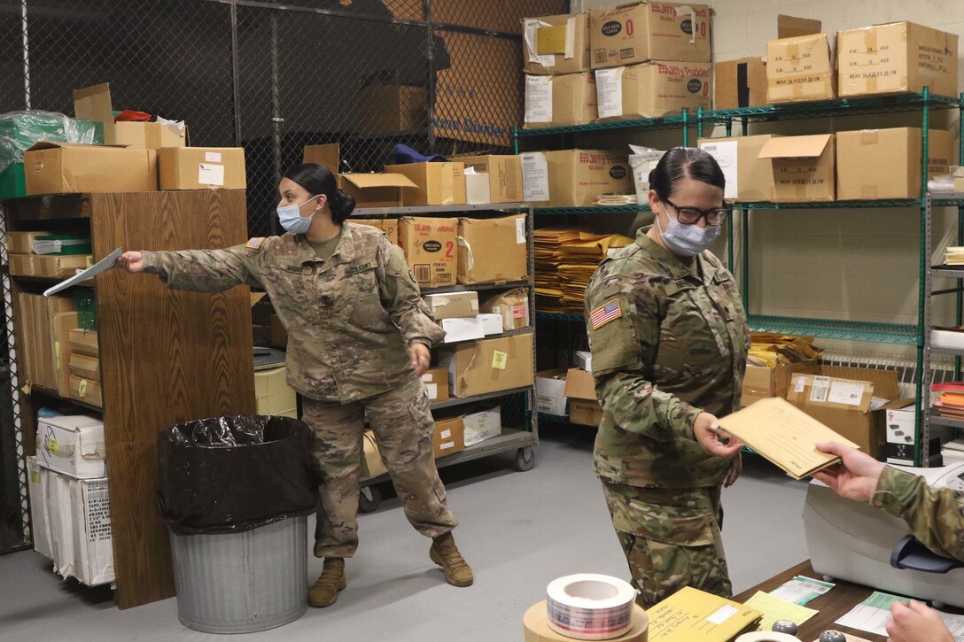 Soldiers like Spc. Dulcina Fragata, a HR specialist who is a graduate of the Army’s Postal Operations Course, demonstrated how to accept the various kinds of mail from Soldiers in a deployed environment.